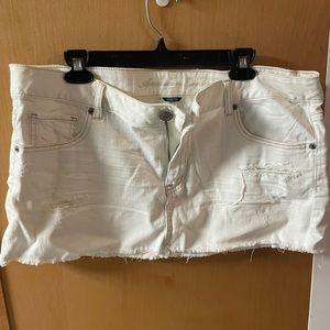 White jean distressed mini skirt great condition